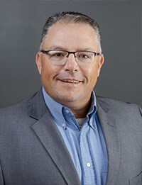 Portrait of realtor Greg Topping